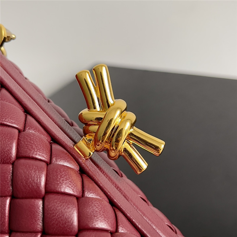 b0tt*ga Ven*ta wine red knot clutch