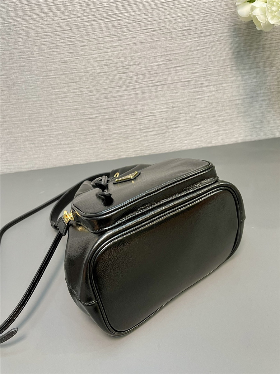 Pra*a black leather bucket crossbody bag