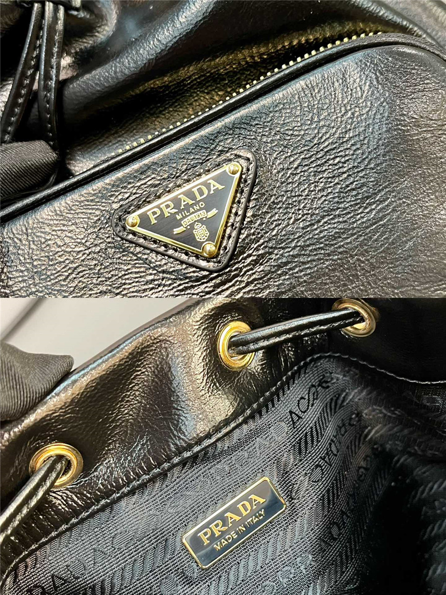 Pra*a black leather bucket crossbody bag