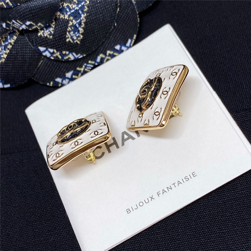 Ch**el white enamel Ch**el stud earrings