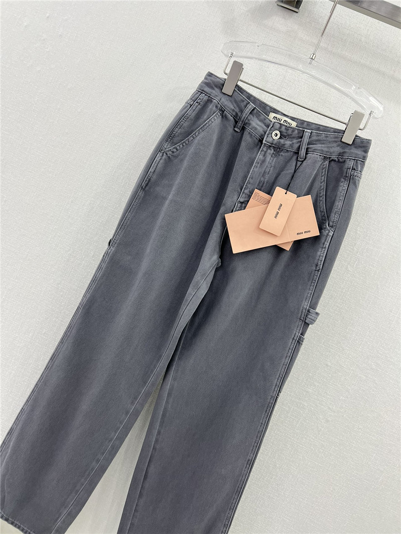 M1um1u waistband letter patch logo embellished jeans