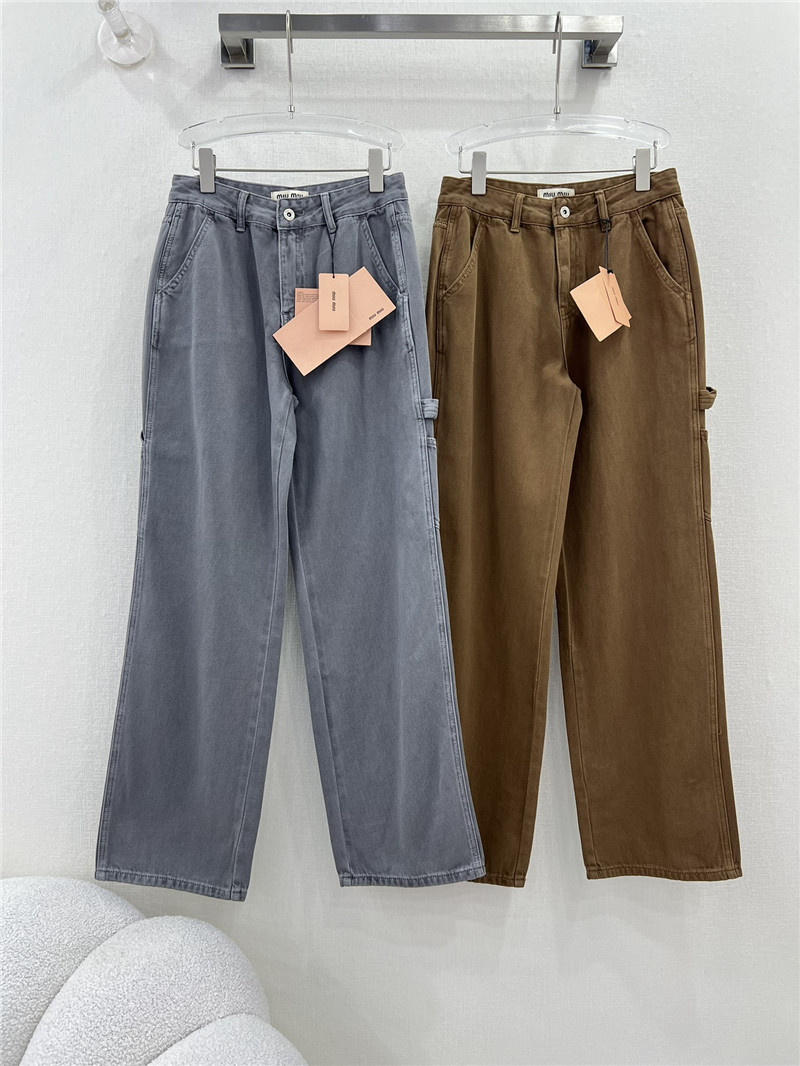 M1um1u waistband letter patch logo embellished jeans