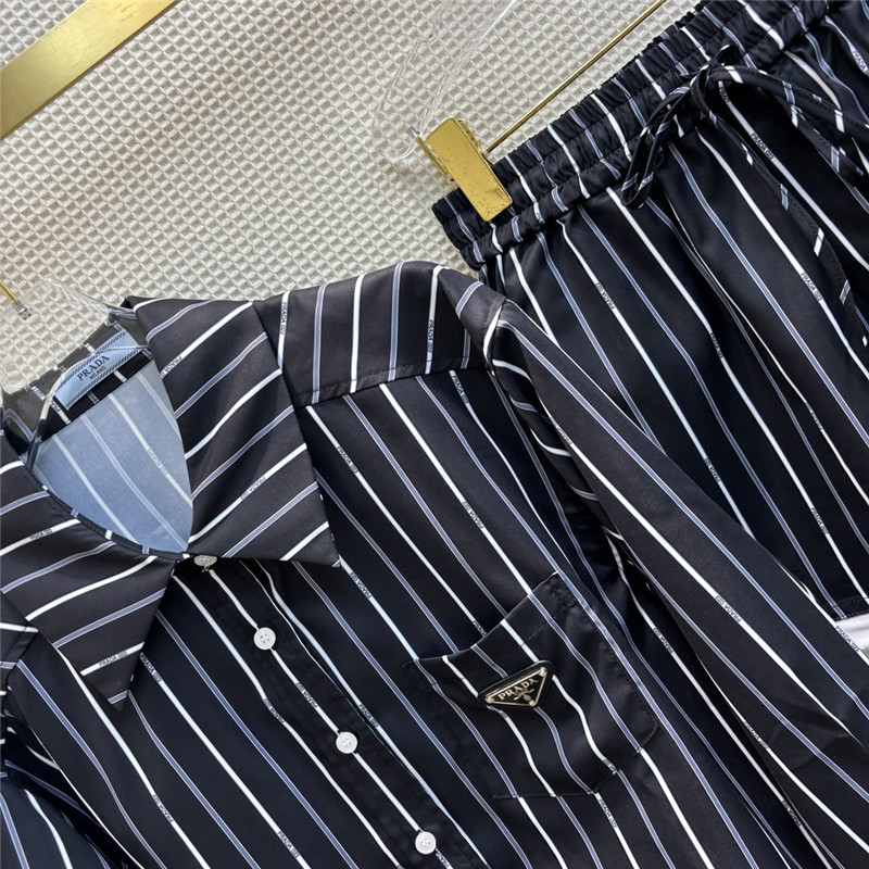 Pra*a triangle logo decorative stripe suit
