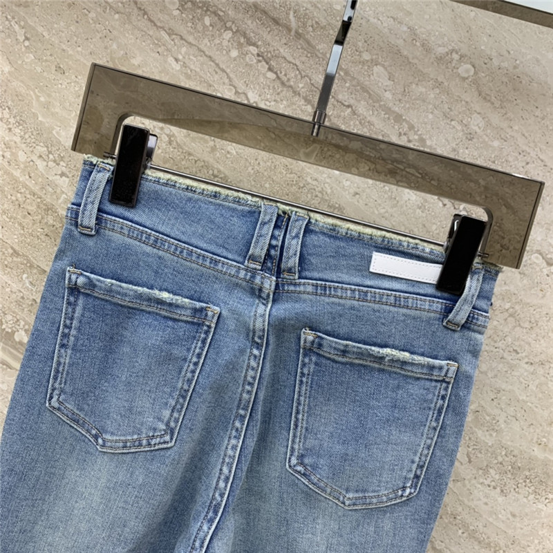 M1um1u micro logo embellished bootcut jeans