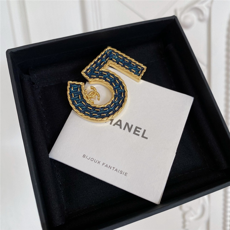 Ch**el denim 5 word double c brooch