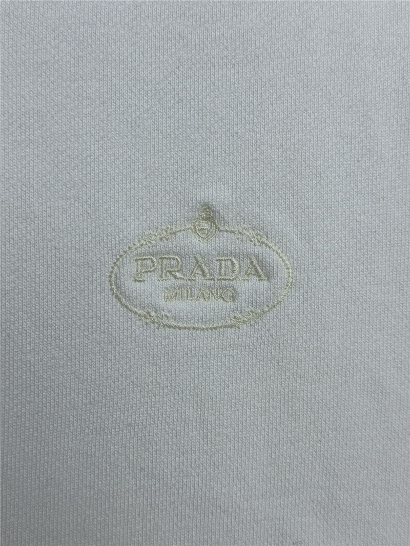 Pra*a white sports suit