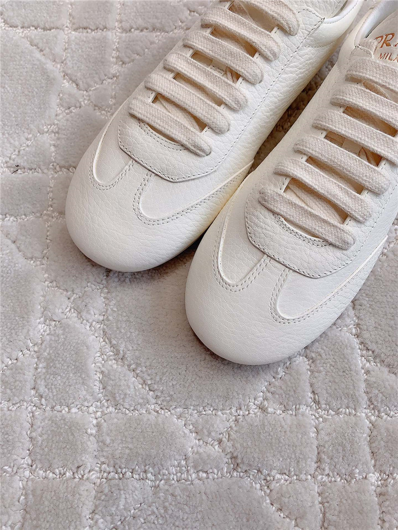 Pra*a triangle logo sneakers