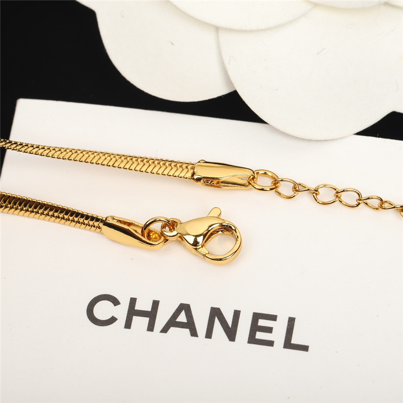 Ch**el gold c snake bone chain bracelet