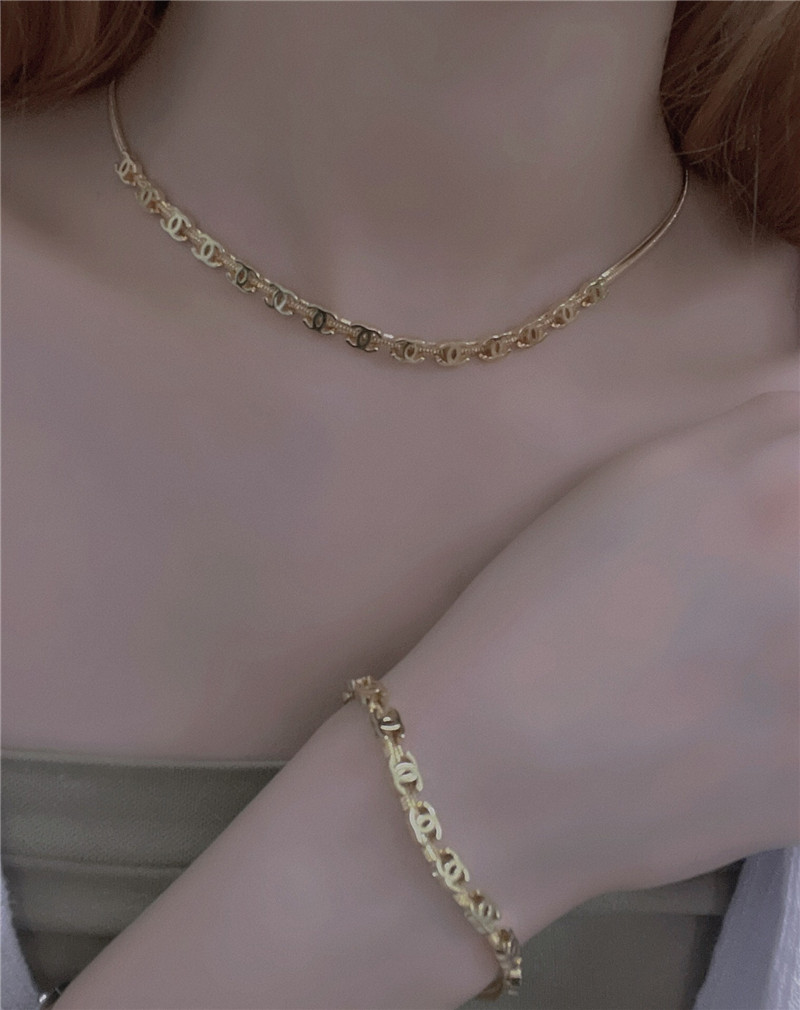 Ch**el gold c snake bone chain bracelet