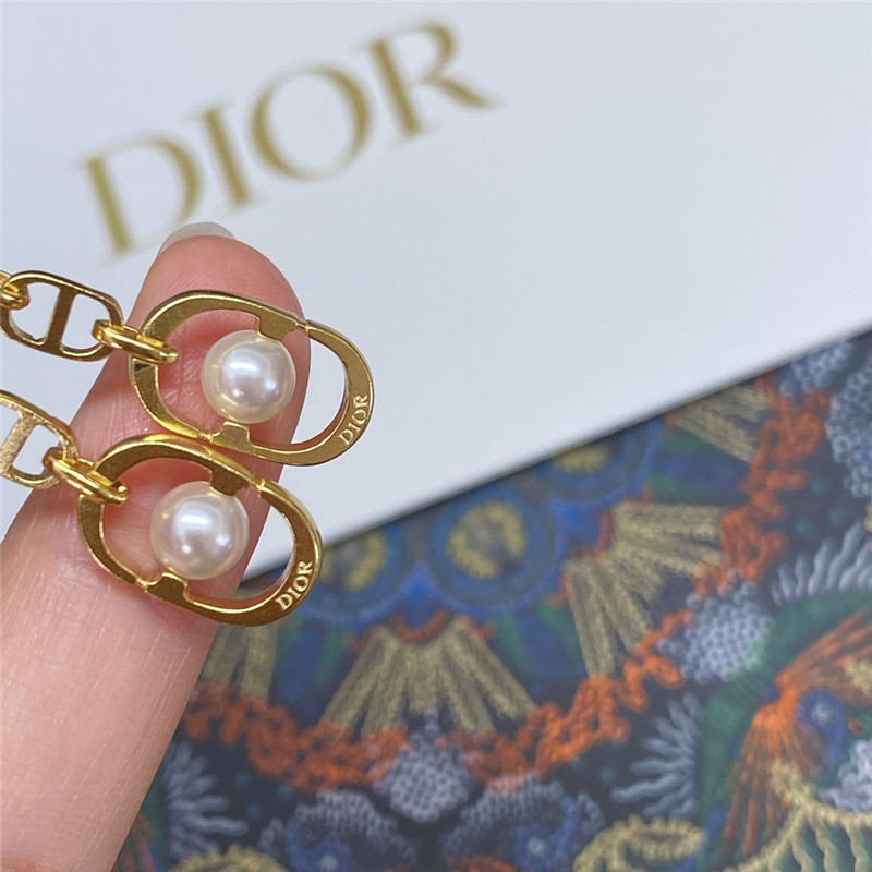 D10r u-shaped pearl tassel earrings