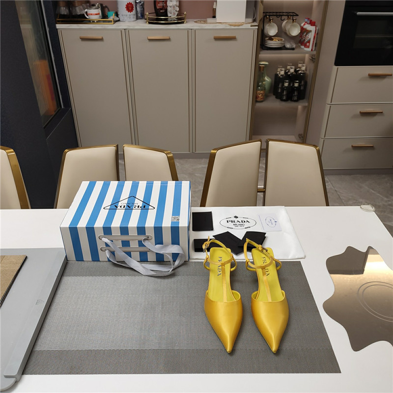 Pra*a leather slingback pumps in yellow