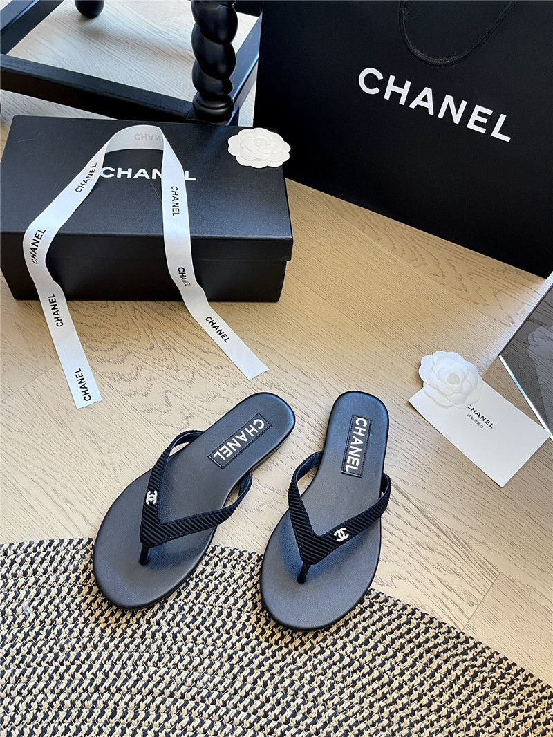 Ch**el flat black flip flops