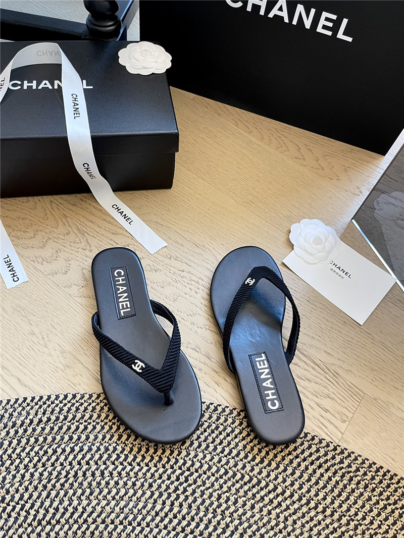 Ch**el flat black flip flops