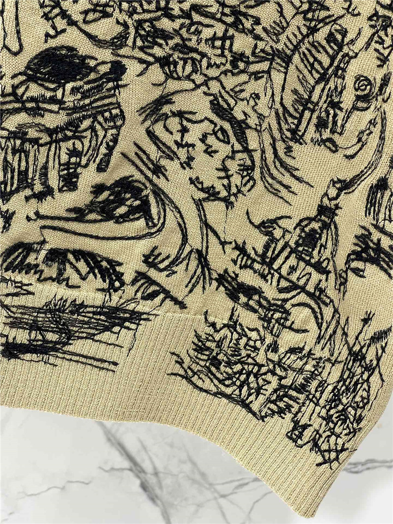 D10r embroidered painting knit t-shirt in beige