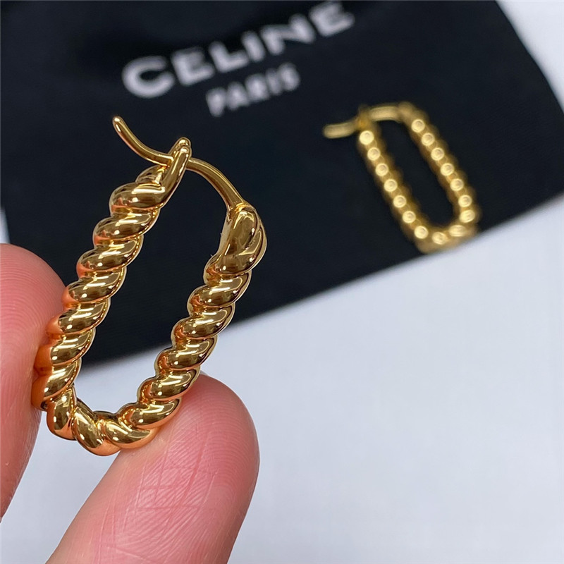 Ce1i*e twist earrings