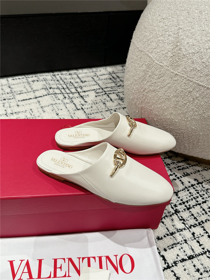 Va1e*ntin0 garavani vlogo signature leather mules in white