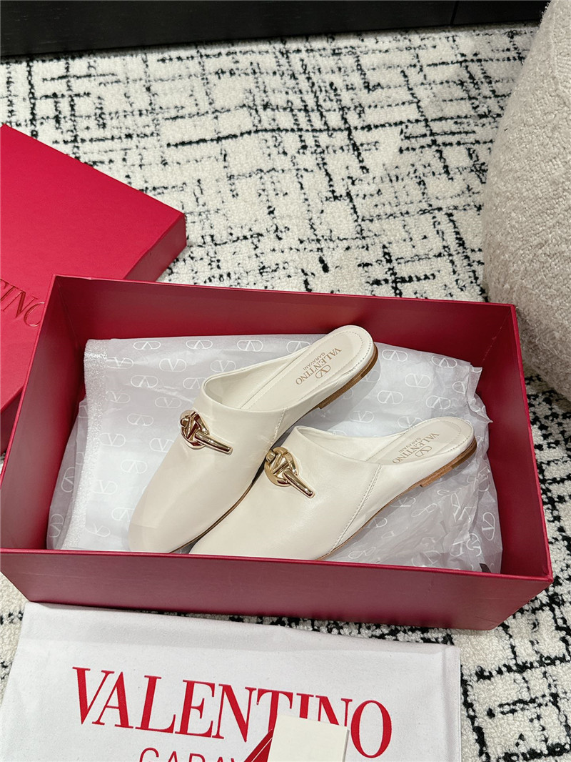 Va1e*ntin0 garavani vlogo signature leather mules in white