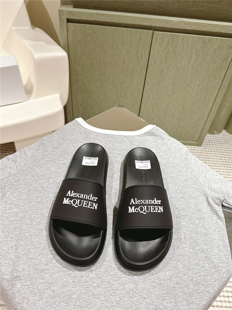 a1exa*der Mcqv*en black logo slide