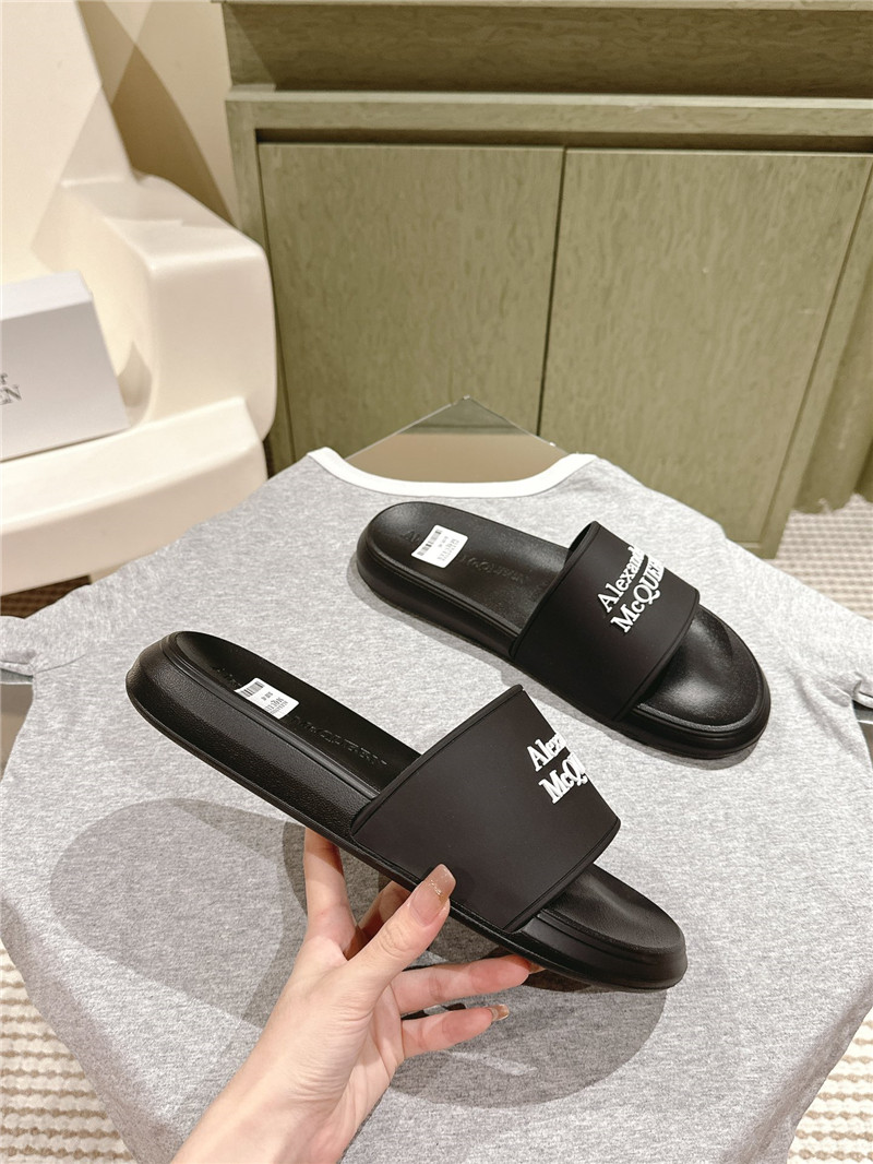 a1exa*der Mcqv*en black logo slide