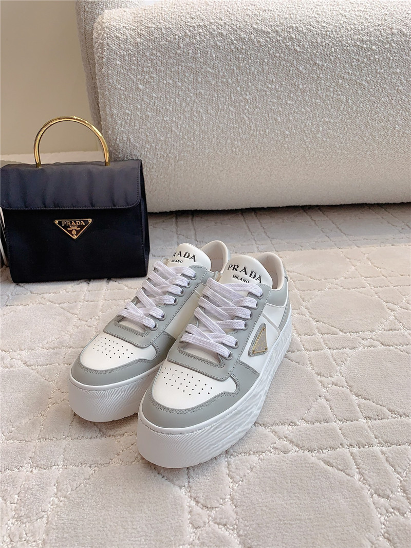 Pra*a triangle-logo brown lace-up sneakers