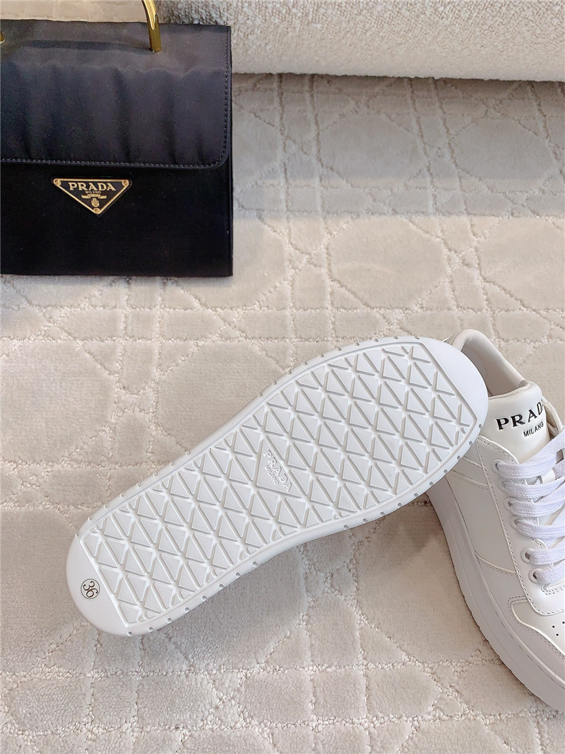 Pra*a triangle-logo white lace-up sneakers
