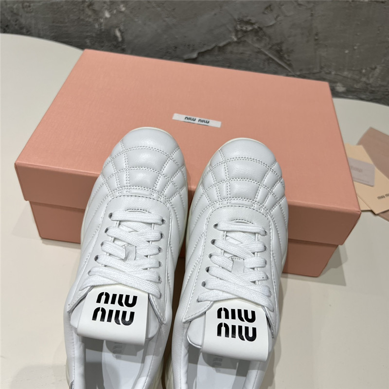 Miu Miu Quilted Leather Lace-up Sneakers