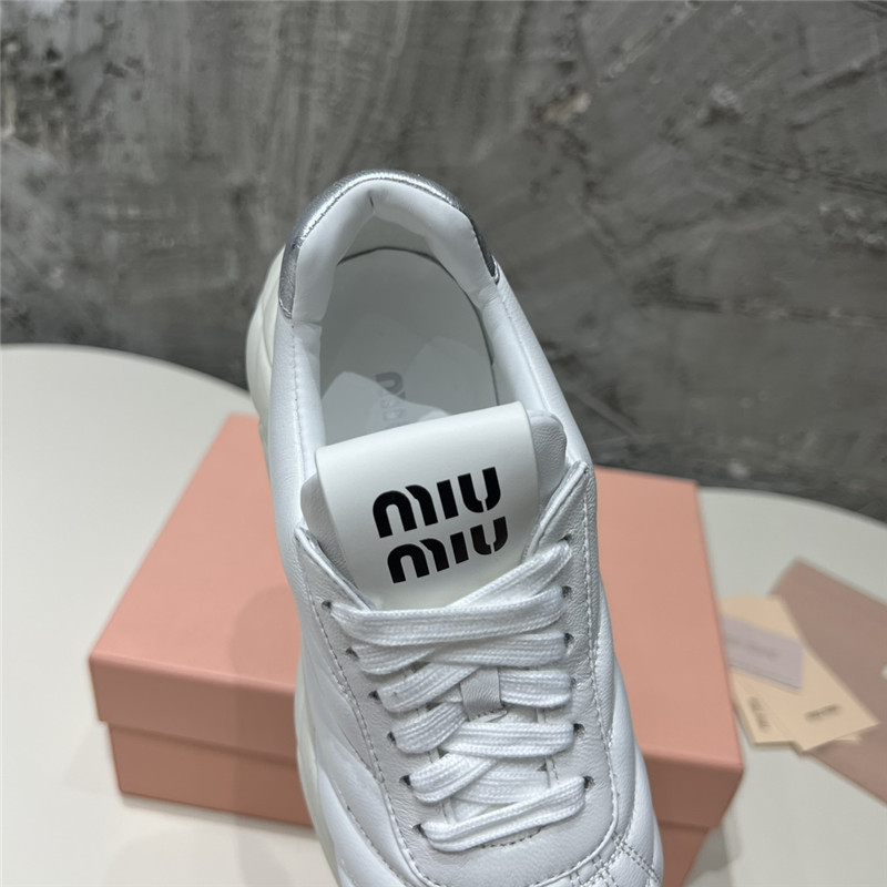 Miu Miu Quilted Leather Lace-up Sneakers