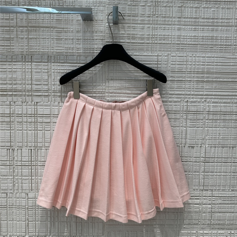 Pra*a fake two-piece top + pleated skirt replica d&g clothing