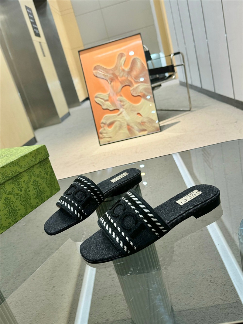 Gvc*1 slide with script in light black denim