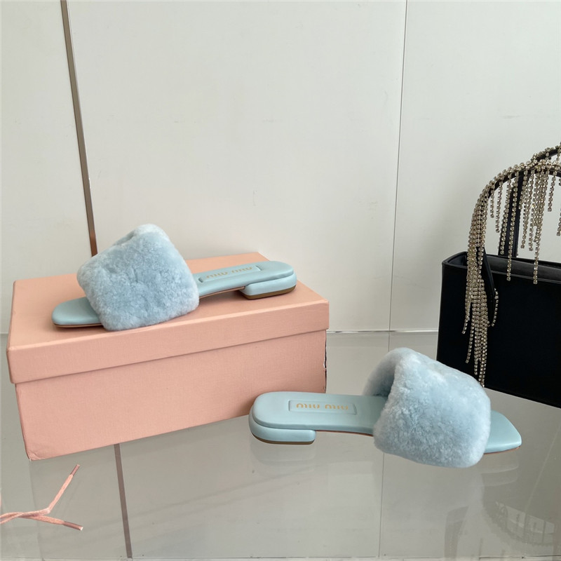 Miu Miu Blue Matelassé Fur Slides with Metal Lettering