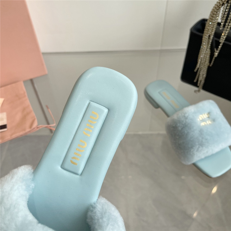 Miu Miu Blue Matelassé Fur Slides with Metal Lettering