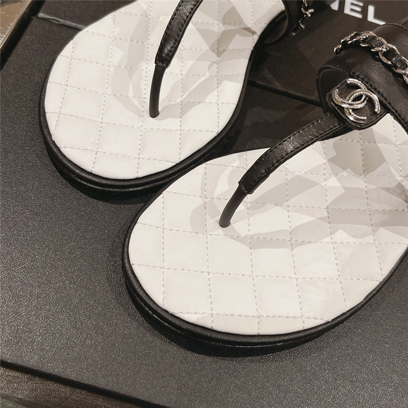 Ch**el quilted t-strap chain flat sandals black and white