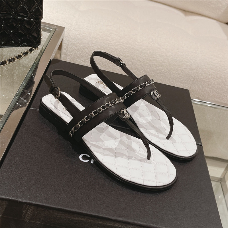 Ch**el quilted t-strap chain flat sandals black and white
