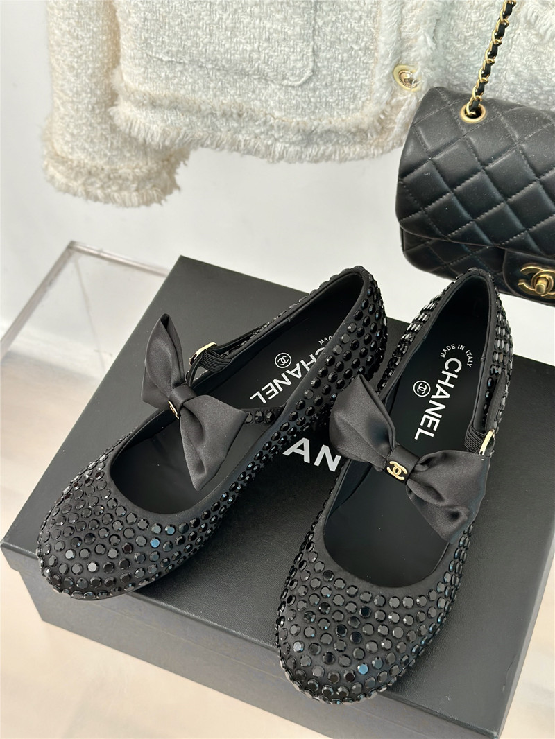 Ch**el bow mary jane sandals in black satin and studs