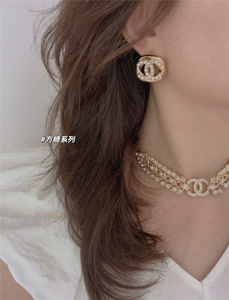 Ch**el hollow twisted sugar cube earrings