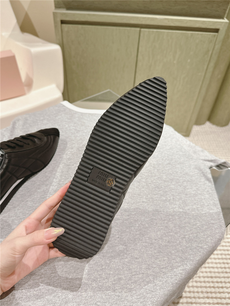 Miu Miu Point Toe Quilted Leather Sneakers in Black