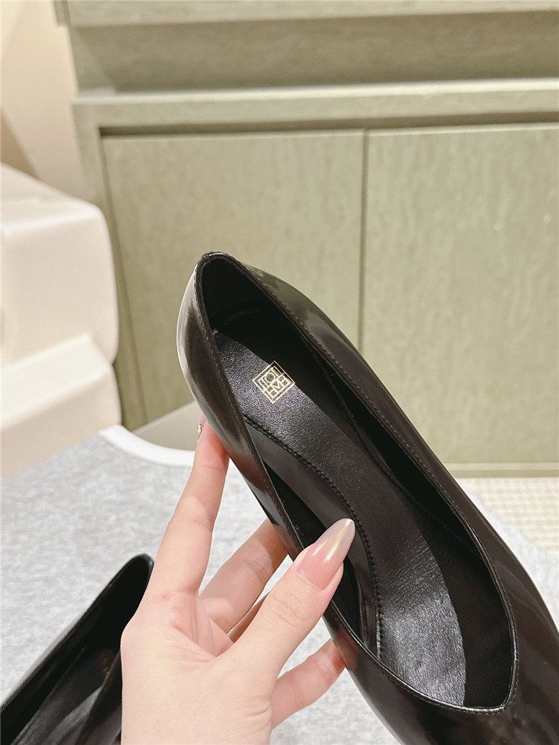 Totême Wedge-Heel Abrasivato Pumps in Black
