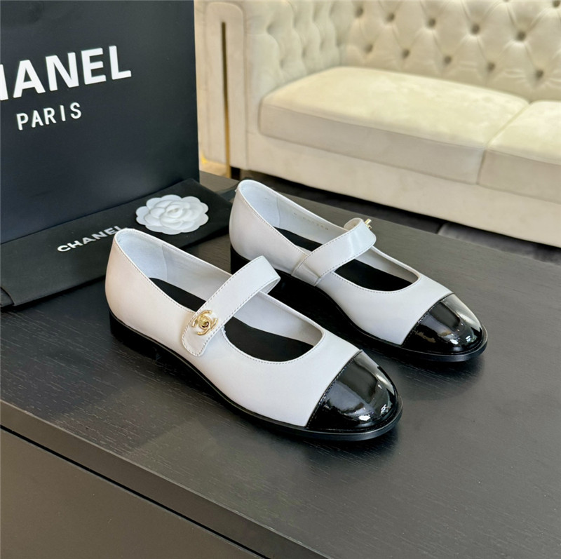 Ch**el gold interlock mary janes in white and black calfskin