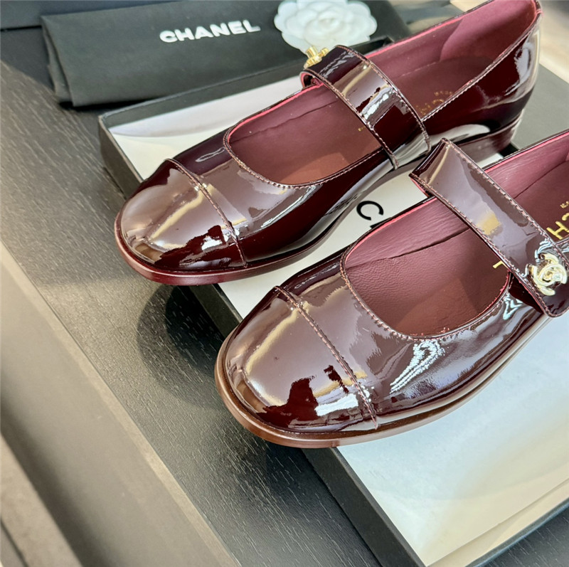 Ch**el gold interlock mary janes in burgundy patent calfskin