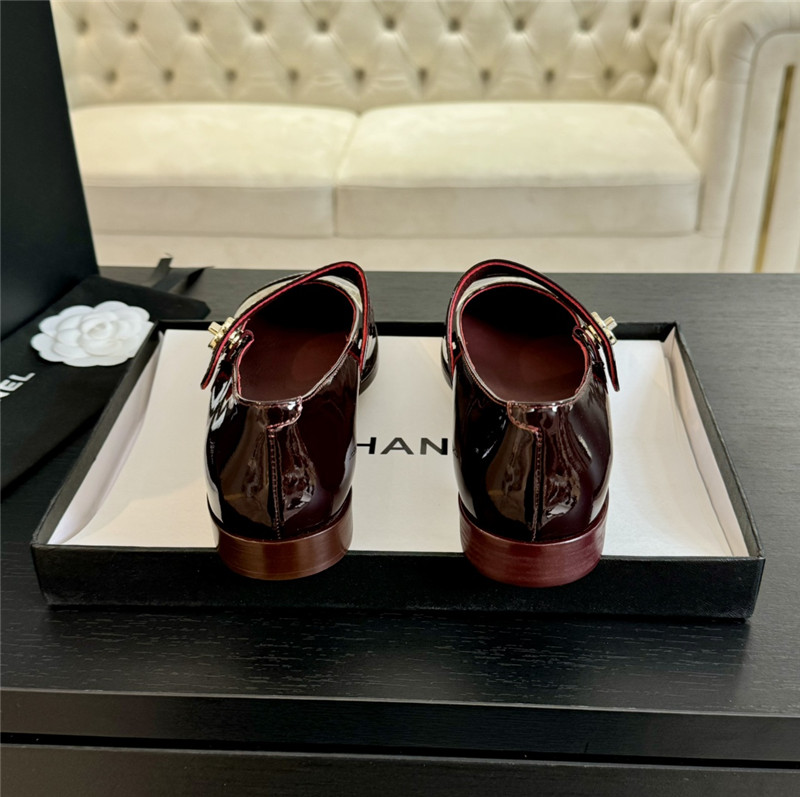 Ch**el gold interlock mary janes in burgundy patent calfskin
