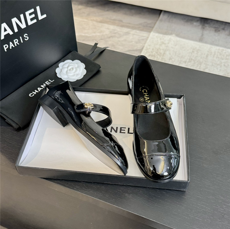 Ch**el gold interlock mary janes in black patent calfskin