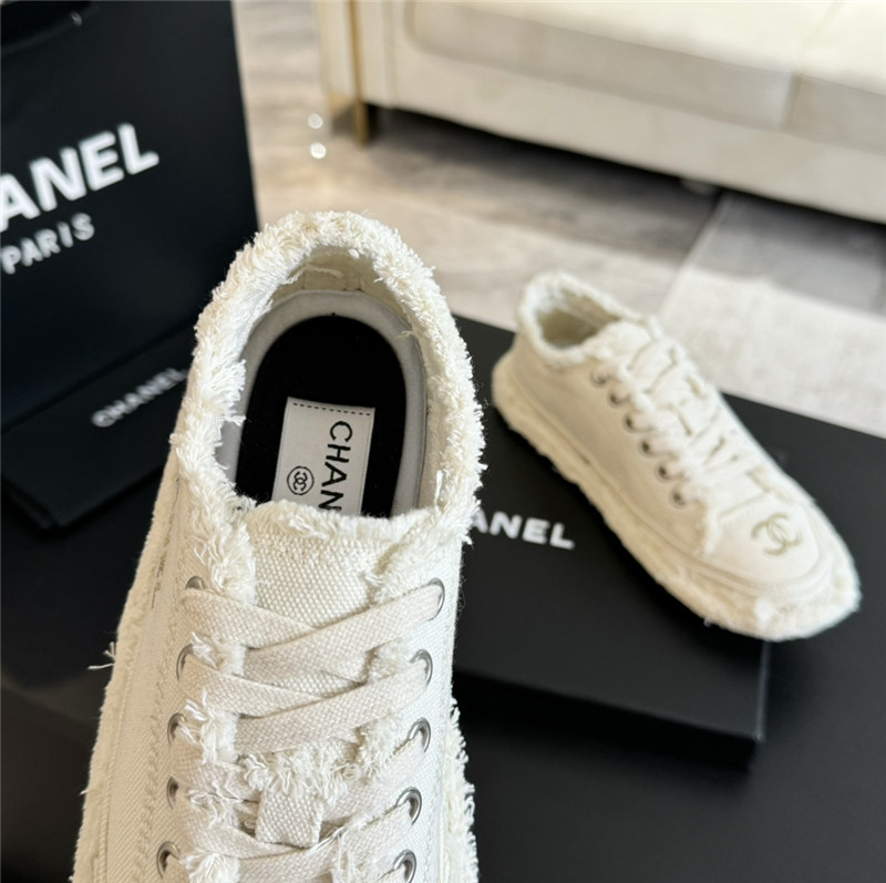 Ch**el lace-up canvas sneakers in white