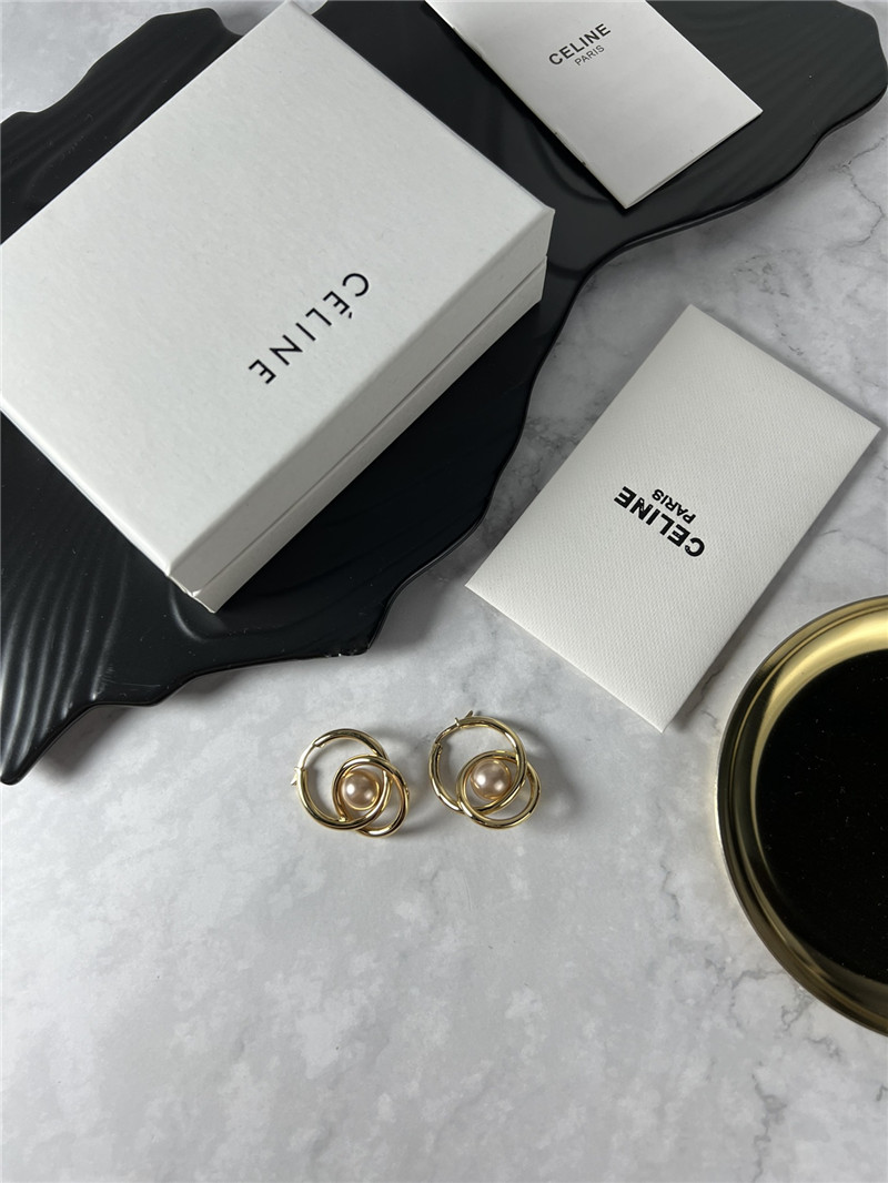 Ce1i*e double loop pearl earrings