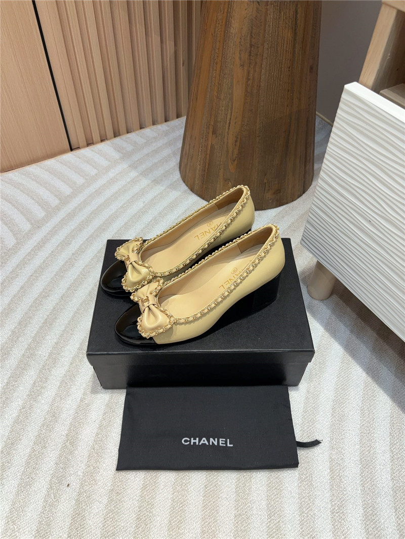 Ch**el bow chain trim ballet pumps in beige and black leather