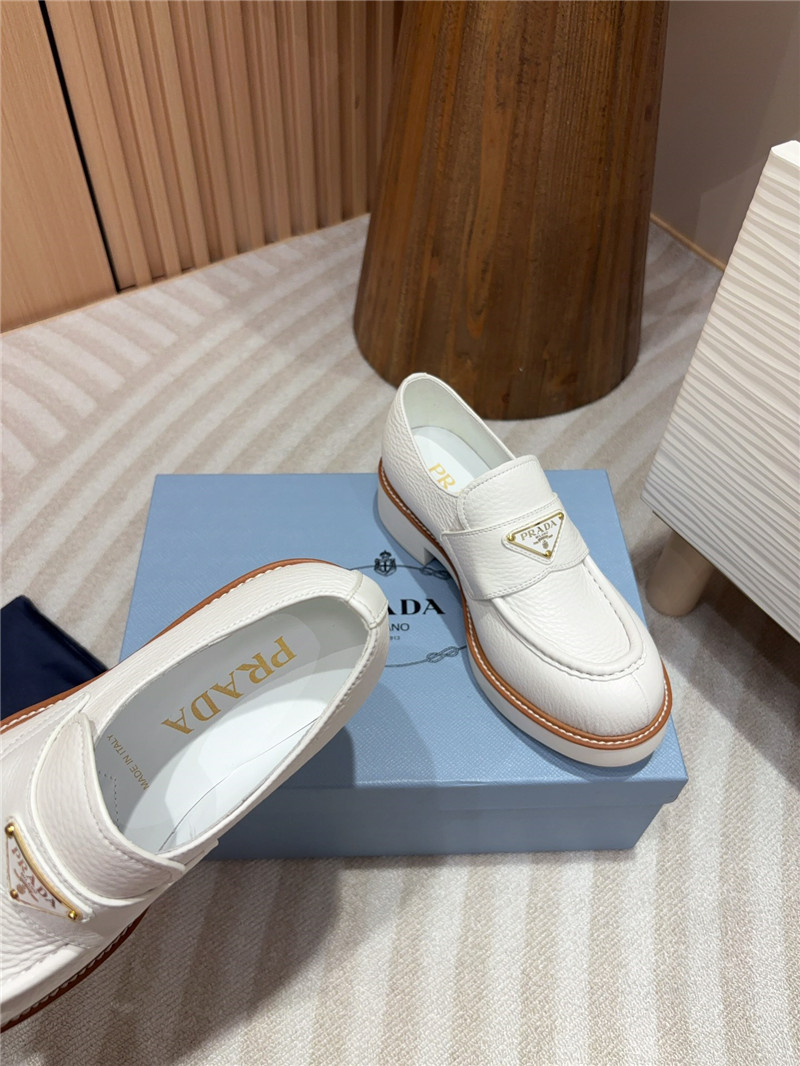Pra*a white double chocolate leather loafers