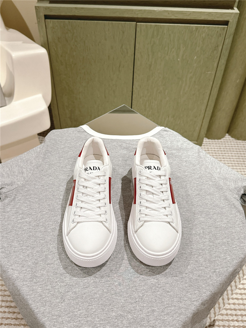 Pra*a white laced low-top sneakers