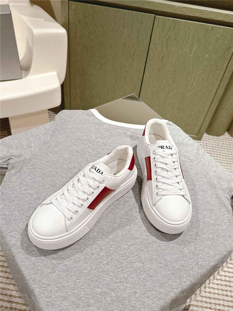 Pra*a white laced low-top sneakers