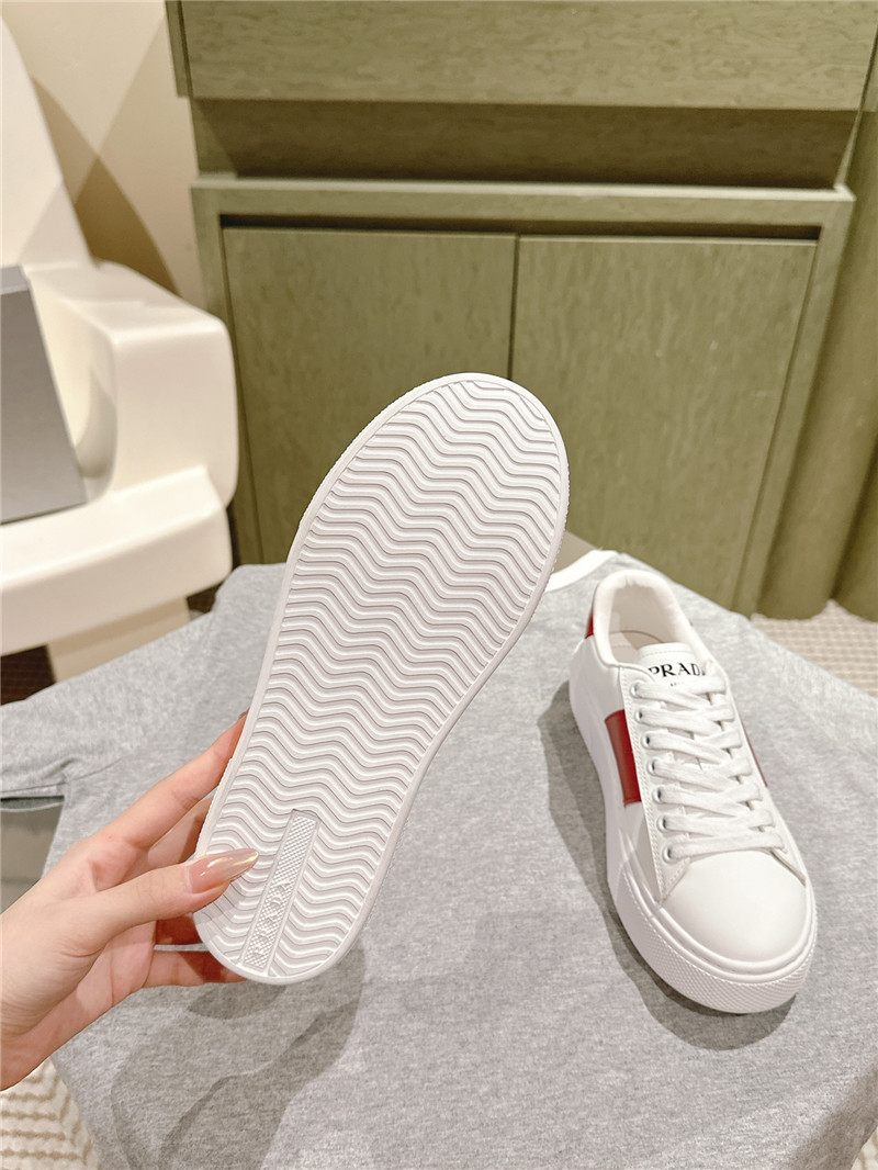 Pra*a white laced low-top sneakers