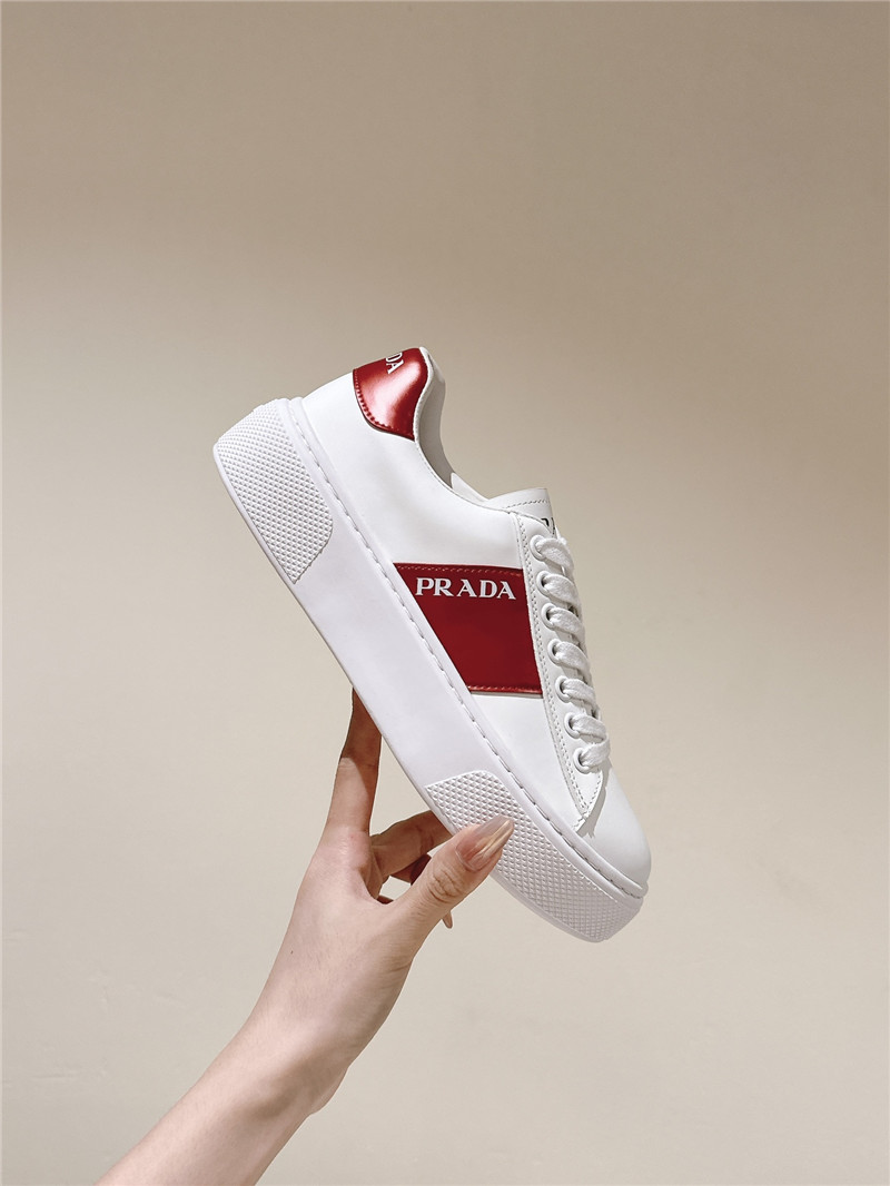 Pra*a white laced low-top sneakers