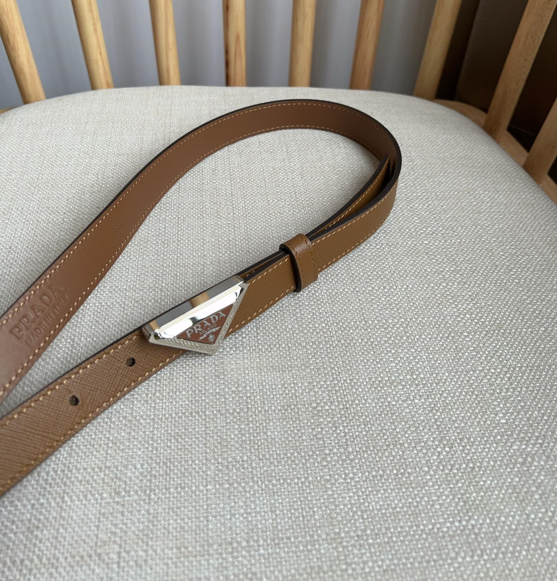 Pra*a triangle logo outline belt